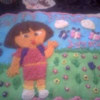 Dora Flower Garden This is my first cupcake cake order, 75 cupcakes decorated with all buttercream. Dora is done with star tip. The picture is not a good one...