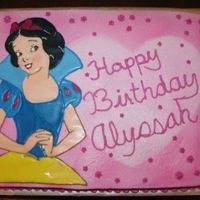 Snow White Snow White is made of color flow. I used the Wilton color mist to "airbrush" the icing pink. I placed a paper heart on the cake...