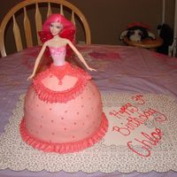 Barbie Cake My daughter of course is a Barbie Fanatic! This was my first doll with the wonder mold pan. I also have an 8" on the bottom of it, as...