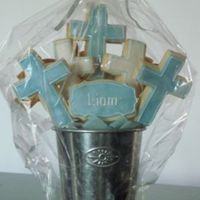 Baptism Cookies NFSC covered in fondant, RI and luster dust. Made for a friend who's god son's brother was getting baptised!