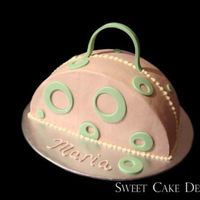 Mod Purse Inspired by Gourmetcakes. Thank you so much. Buttercream 10 inch cake halves used with gumpaste accents. Cake was for my sister's...