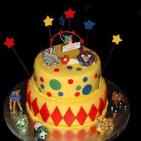 Circus Cakes My God daughter's birthday cake for her circus theme party. The animals are toys and I used ribbon to create circus collars for them....