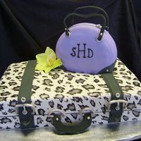 Purse And Suitcase This was done to resemble a pic that client brought me, but with different colors, etc. Fondant with gumpaste accents, and handpainted...