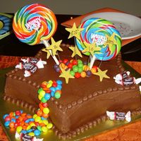 Willy Wonka Made for a child starring in a Willy Wonka play. Dark Chocolate Fudge cake with Peanut Butter Mousse filling. Chocolate buttercream, and...