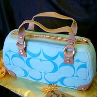 Teal Coach Purse WASC covered in fondant with gumpaste details!