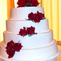 Cheesecake Wedding Cake This cake was made to feed 150 guests. It was a strawberry cheesecake iced with buttercream.