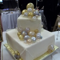 Bubbles cake is covered in fondant and has gelatin bubbles