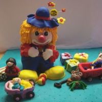 Fair Entry YikeS! My first time competing. The clown, wagon and presents are pound cake. The rest is gumpaste. The theme of the fair is "Clowning...