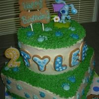 Blues Clues Birthday Cake Two Tiered cake with a Blues Clues Theme. The name is done with cookies.