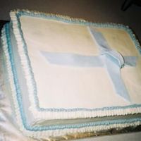 Babtisim Cake This cake was for a baby babtisim. I made the cross out of fondant, but had a really hard time with it. I didn't think it would be...