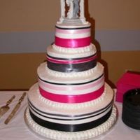 Wedding_1.jpg This was my first wedding cake. Please keep in mind, that I did NOT pick the colors. Other than the colors, I was very happy with the...