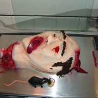 Fresh Flesh! Some poor soul lost his head and has the brains to prove it! Good eaten when still warm! Cake iced in butter creme, airbrushed skins tones...