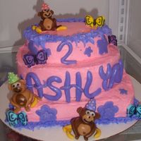 Monkey Cake The monkey's are made of fondant, along with the flowers and banana's- the rest is buttercream. It was for a 2 year old little...