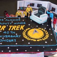 Star Trek Anniversary Cake This cake was make for a Star Trek 40th Anniversary music concert. The icing was buttercream and the star trek logo was made of fondant