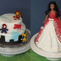 Superhero And Barbie Cake My wife and I are having a friendly competion. She did the barbie cake for our daughter and I did a superhero cake. Vote for your favourite...