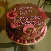 Polka Dot Cake Chocolate cake with ganache, rasperberry and chocolate mousse filling. Pink and burgundy-ish polka dots. That's what my customor...