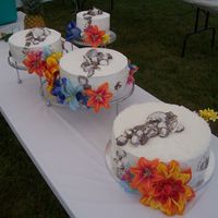Wedding Cake This was for my cousin's wedding. Top is WHT cake w/Blueberry, Middle is WHT w/Lemon, and WHT w/Raspberry. The "grooms" is...