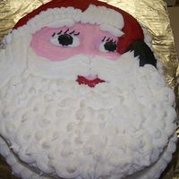 Jolly Santa Face Cake was baked in an old Wilton cake pan. Made for an office Christmas party. Vanilla white cake and buttercream icing. Everyone loved it...