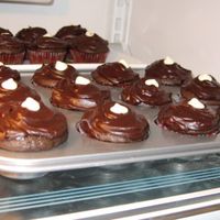 Raspberry Filled Ganache Cupcakes Raspberry creme filled dark chocolate cupcakes topped with ganache