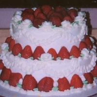 Strawberry Heaven This wedding cake was done for a bride who was a vegan...she wasn't going to eat anything except the strawberries. But I thought it...