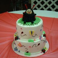 Lady Bug First birthday for my cousin's daughter. Topper was her smash cake, similar to one of her toys.wasc with buttercream. Cake design by...