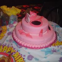 Pretty In Pink Dress Up Cake Covered in Fondant, The tiara, pearls, lipstick, sunglasses, etc are all edible