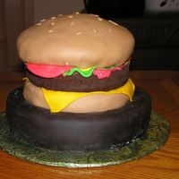 Burger Cake This burger is made of cake layers covered in fondant. I left the "burger" pattie un-iced for the texture of a hamburger. It'...