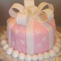 Present Cake The bow is made from gum paste, the cake covered in fondant