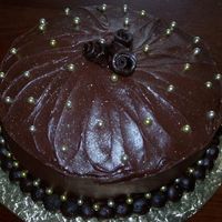 Chocolate Decadence I have a friend who insists every year he justs wants a "plain chocolate cake". I tell him I have so much fun decorating cakes,...