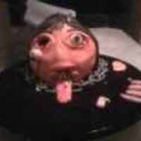 Igores Head On A Platter! Igores head is made of red velvet cake and covered in fondant. The magets are made with rice crispies covered in fondant. This was a very...