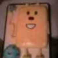 Wow Wow Wubbzy Cake Wubbzy was air brushed with liquid food coloring. The ball and wubbzy was made of cake and the bird was made of fondant. The cake is also...