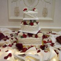 Off-Set Square Wedding Cake off-set square wedding cake with fresh flowers between tiers