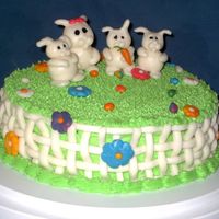Final Easter Cake Here is the finished easter cake that I did. I ended up forming flowers and little eggs out of MMF