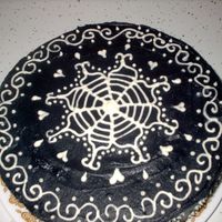 Henna Inspired Cake Inspired by my fav henna design. Black frosting with white royal icing desighn