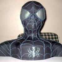 Black Spiderman a red velvet cake with chocolate carmel filling. The man who wanted this is a special needs fella who LOVES spiderman. This was my first...