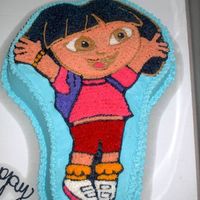 My First Dora Cake This was a cake I did for a friends daughters Birthday. It is a WASC with rasberry filling.