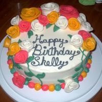 Shellys Birthday WASC with white chocolate raspberry creamer filled with buttercream fondant roses and buttercream accents
