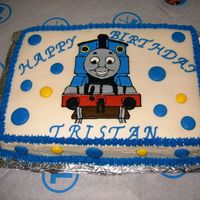 S_Birthday_002.jpg This was for my son's 2nd birthday. Thomas the Tank Engine is done in color flow.