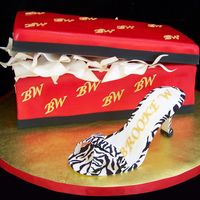 Zebra Print High Heel Shoe And Shoe Box The shoe box and lid are cake. The high heel shoe is made from sugarpaste with hand painted zebra stripes