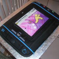 Sidekick Cellphone Motorola sidekick cellphone. 11x15 carved cake. Decorations are fondant, airbrush, and food coloring markers.