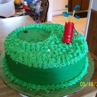 Golf Cake The golf bag, club ends and flag are fruit roll ups.The golf clubs and pole are spaghetti.