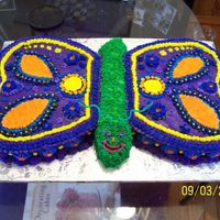 Crazy Butterfly I made the wings using a heart shaped pan and cutting off the corners.The body is twinkies and the corners of the heart and lots of icing...