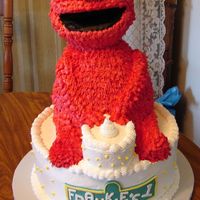 First Birthday Elmo Cake Yeah, it's finally done!! I was having anxiety about doing this cake. I did the test Elmo and he came out great. But, when I did the...
