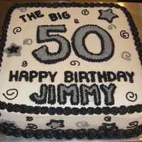 The Big 5-0 Cake is decorated in buttercream using the birthday boy's favorite colors.