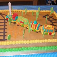 Choo Choo Train Cake This is a train cake i did for my nephew's 2nd Birthday. He adores trains, so i made the track and the cacti using fondant since we...