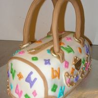Louis Vuitton Here's another view of the LV purse.