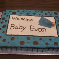 Brown & Blue Baby Shower This is all buttercream except for the gumpaste baby sleeping on top.