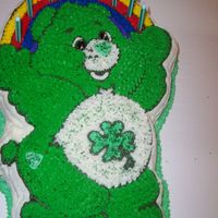 Lucky Care Bear Cake believe or not this cake was for an adult who loved care bears. lucky care bear. cake inside is dyed green with food coloring.