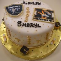 Dscn6830.jpg White almond cake, raspberry filling, vanilla buttercream, fondant. 10".