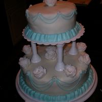 Course 3 Final Here is my course 3 final! A lot of my string work broke, but I love the simplicity of the design with the fondant roses.